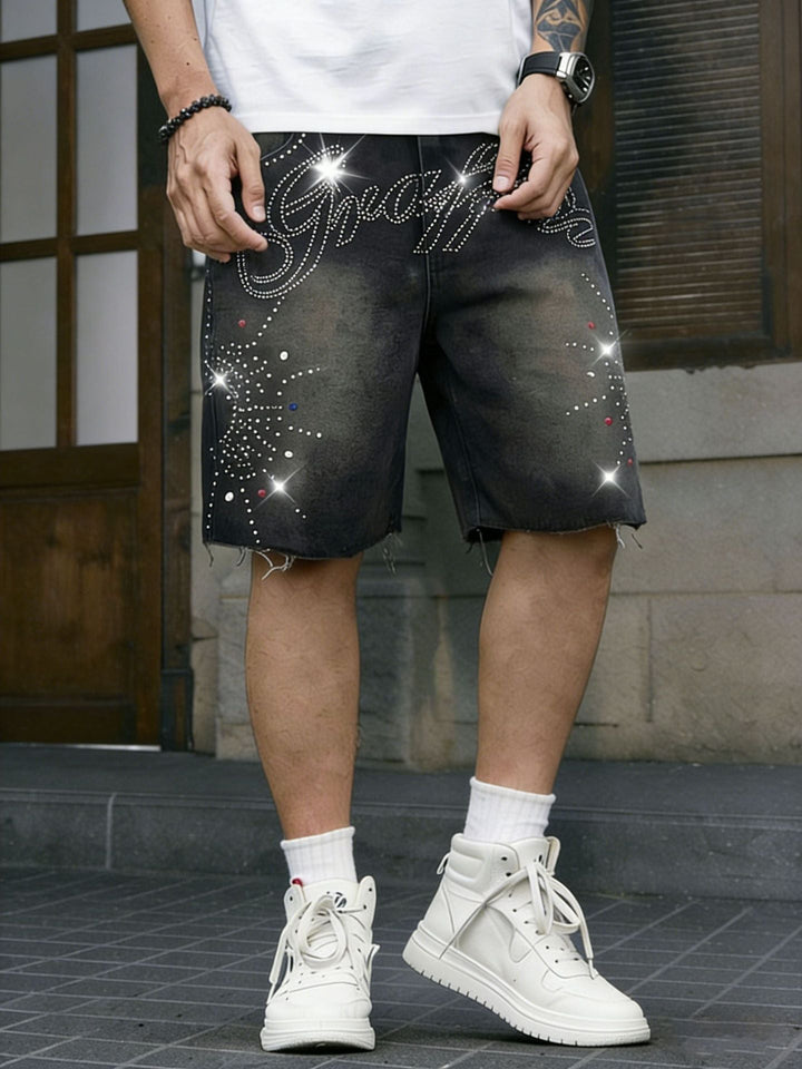 Short en denim noir délavé à inscription en strass, vue de face