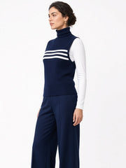 Ensemble bleu marine à col roulé — vue de profil. Soniel Paris.