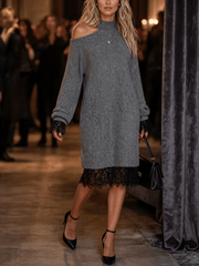 Robe grise en dentelle — vue portée de face, épaule dénudée et dentelle noire à l'ourlet