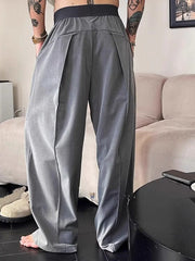 Pantalon ample uni à plis gris — vue portée de dos