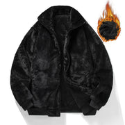 Veste noire zippée à col relevé, vue de face ouverte ; graphique de flamme à côté de la pièce.