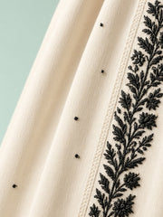 Pantalon brodé à jambe large – détail du tissu et de la broderie