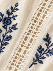 Blouse brodée à décolleté en V — détail