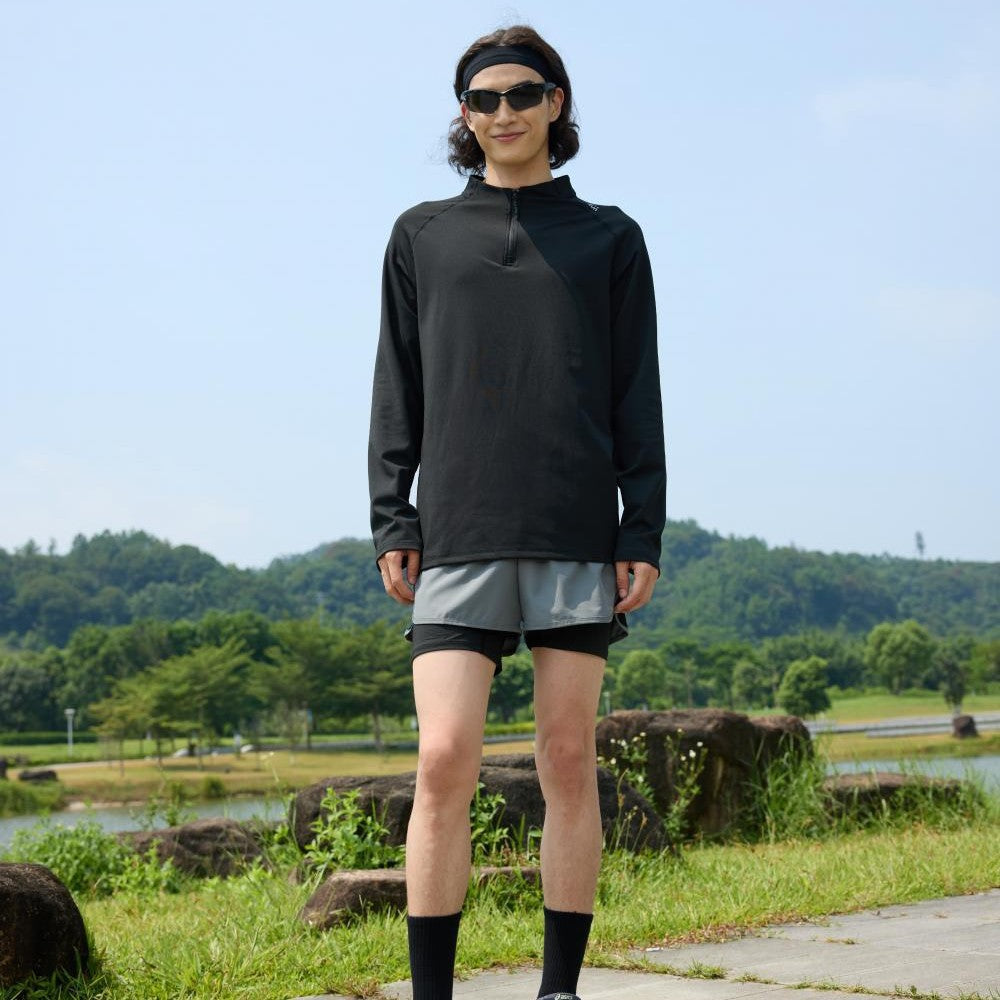 T-shirt sport à demi-zip noir — vue portée de face