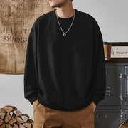 Sweat uni à épaules tombantes noir — vue portée de face