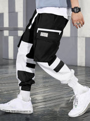 Pantalon cargo contrastes couleurs noir et blanc — vue portée de profil, en marche