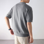 Polo pull-over à manches courtes gris — vue portée de dos, de côté