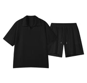Ensemble polo col V noir, vue de face à plat