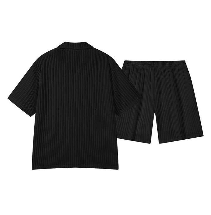 Ensemble polo col V noir, vue de dos à plat