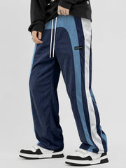 Pantalon ample à panneaux contrastants bleu — vue portée de trois-quarts