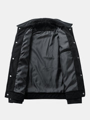 Veste noire ouverte montrant la doublure grise et une poche intérieure