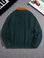 Dos de la veste vert foncé à col marron, posée à plat.