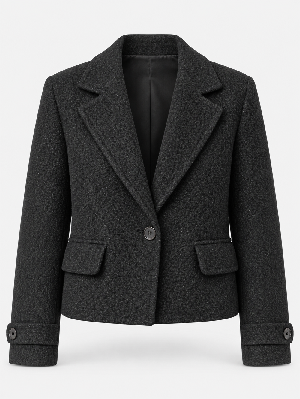 Veste courte noire à larges revers, pièce isolée de face
