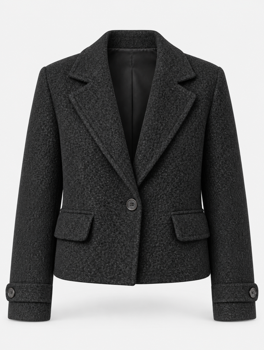 Veste courte noire à larges revers, pièce isolée de face