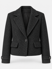 Veste courte noire à larges revers, pièce isolée de face