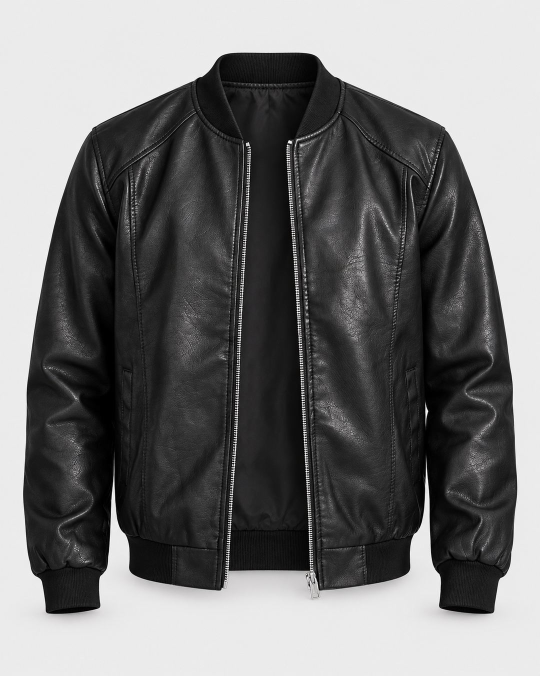 Blouson noir zippé, vue de face sur fond gris clair