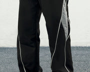 Pantalon cordon bandes latérales — gros plan de la jambe avec liseré blanc et couture courbe