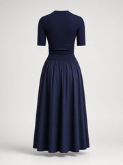 Robe midi bleu marine à col rond — pièce isolée, vue de dos
