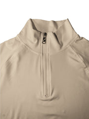 Haut demi-zip beige, gros plan du col montant zippé