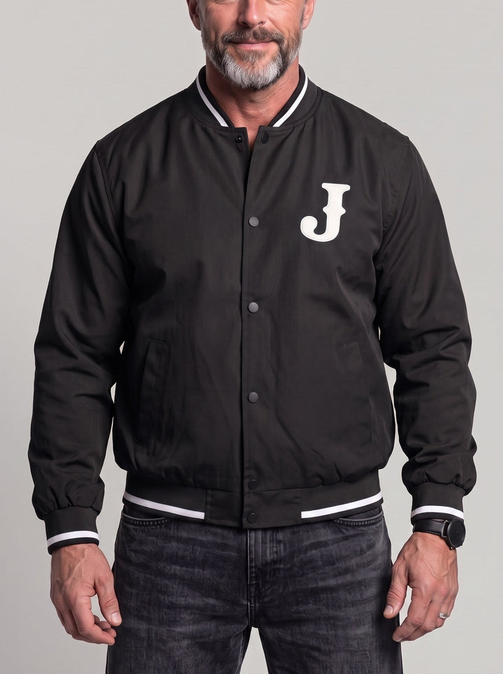 Blouson à motif lettre et bordures rayées noir — vue de face