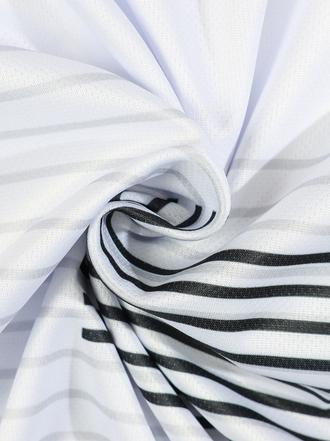 Ensemble à motifs graphiques blanc, détail du tissu