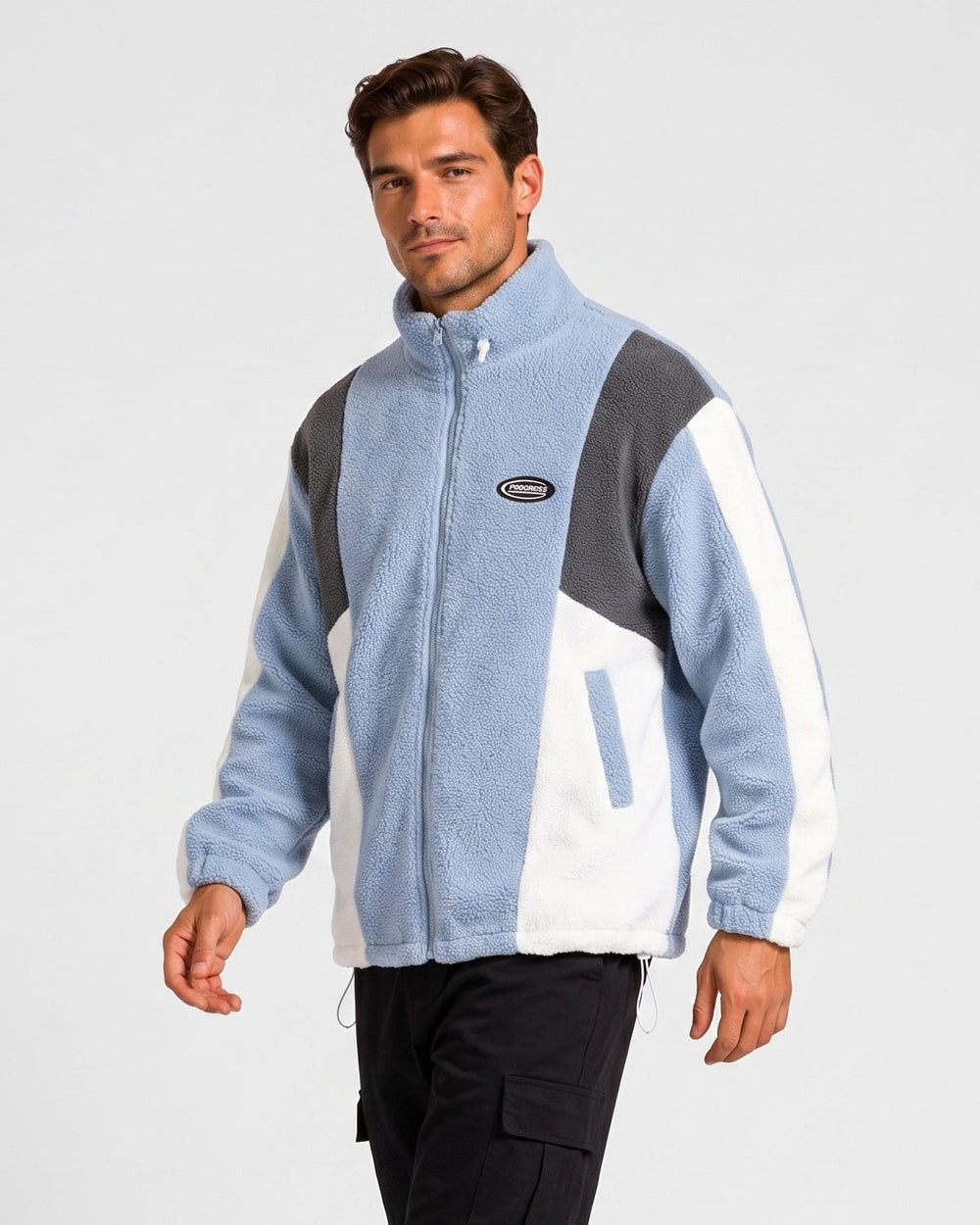 Veste zippée à empiècements contrastés — vue de trois-quarts