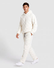 Ensemble sweat à capuche texturé blanc — vue portée de profil, en marche