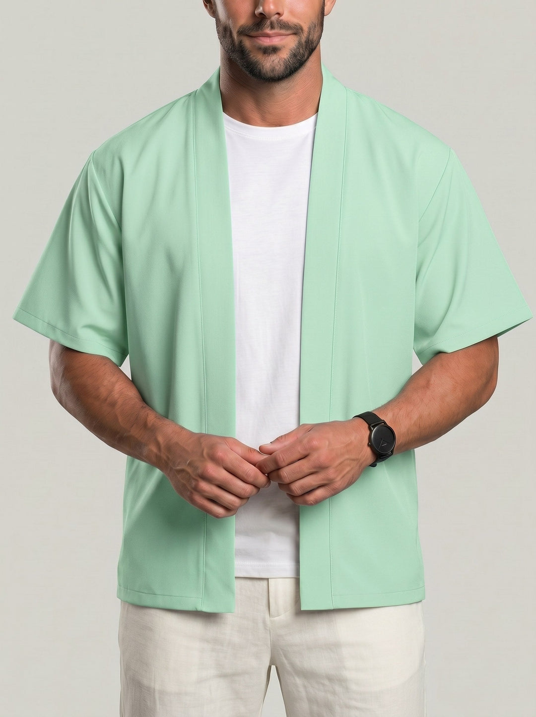 Haut uni ouvert vert clair, vue portée de face
