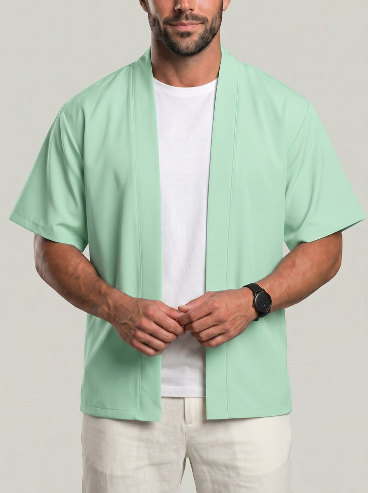 Haut uni ouvert vert clair, vue portée de face