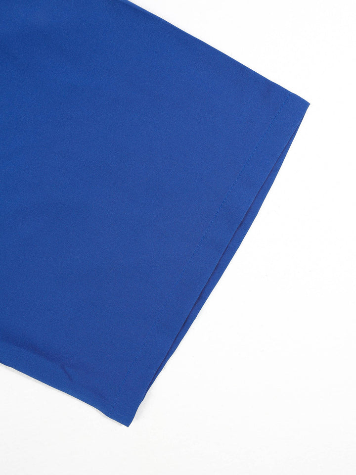 Haut uni ouvert bleu, détail de la manche