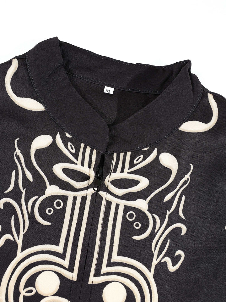 Ensemble deux pièces à motifs graphiques noir — gros plan du col et du motif