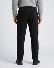 Pantalon jogging cordon poches zippées noir — vue portée de dos