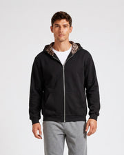 Veste zippée à capuche noire doublée léopard, vue portée de face