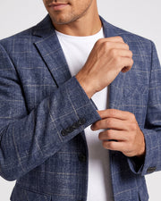Veste de costume bleue à carreaux, détail de la manche
