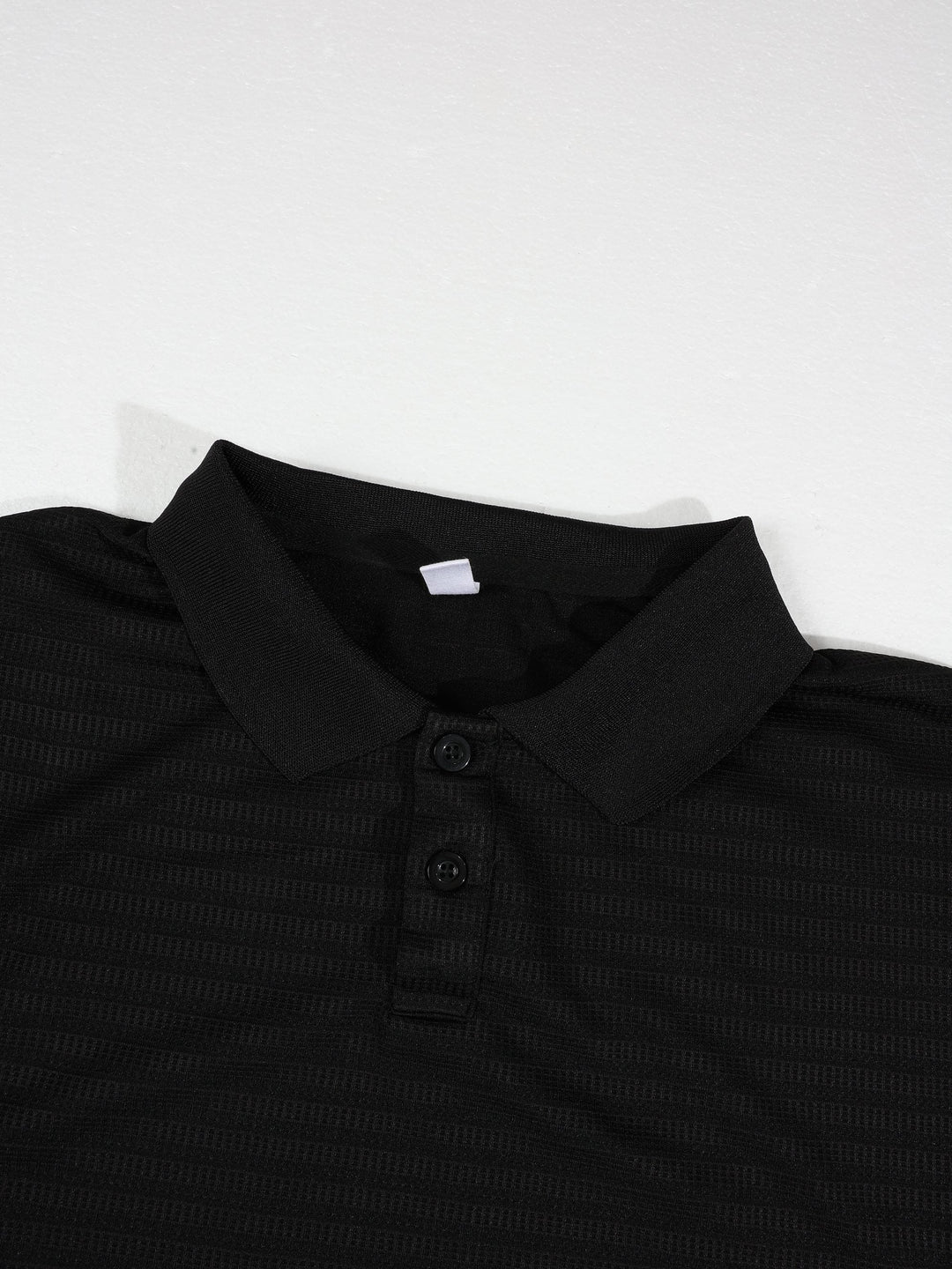 Polo en maille gaufrée — détail de la matière