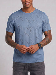 T-shirt col rond à motif marbré, porté