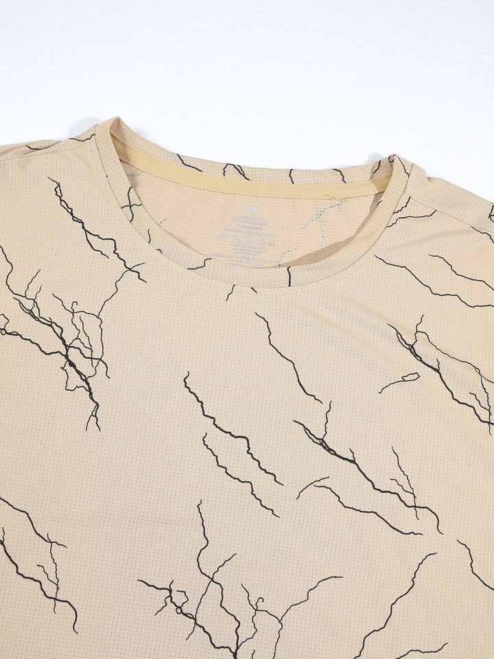 T-shirt col rond à motif marbré, porté