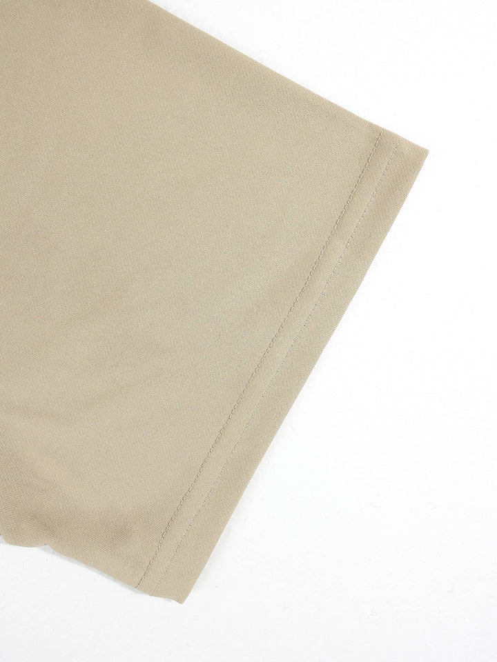 Haut à petit col beige, détail de la manche