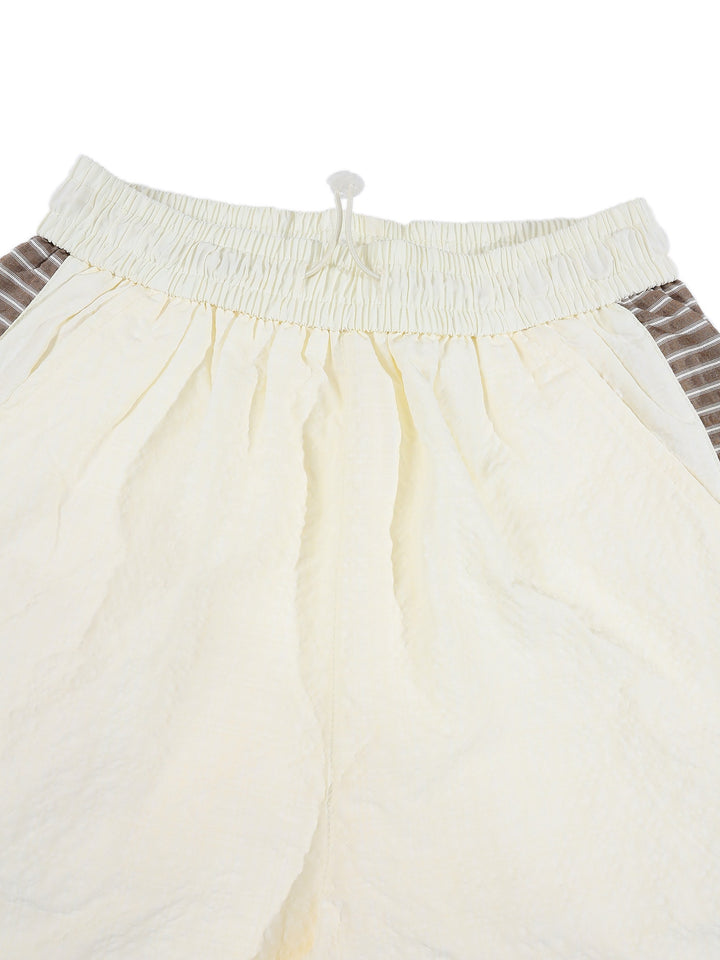 Ensemble haut demi-zip et short — vue complémentaire du produit.