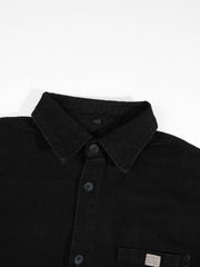 Surchemise en denim d’esprit rétro noir — détail col et premiers boutons, à plat