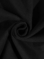 Surchemise en denim d’esprit rétro noir — gros plan de la trame du tissu