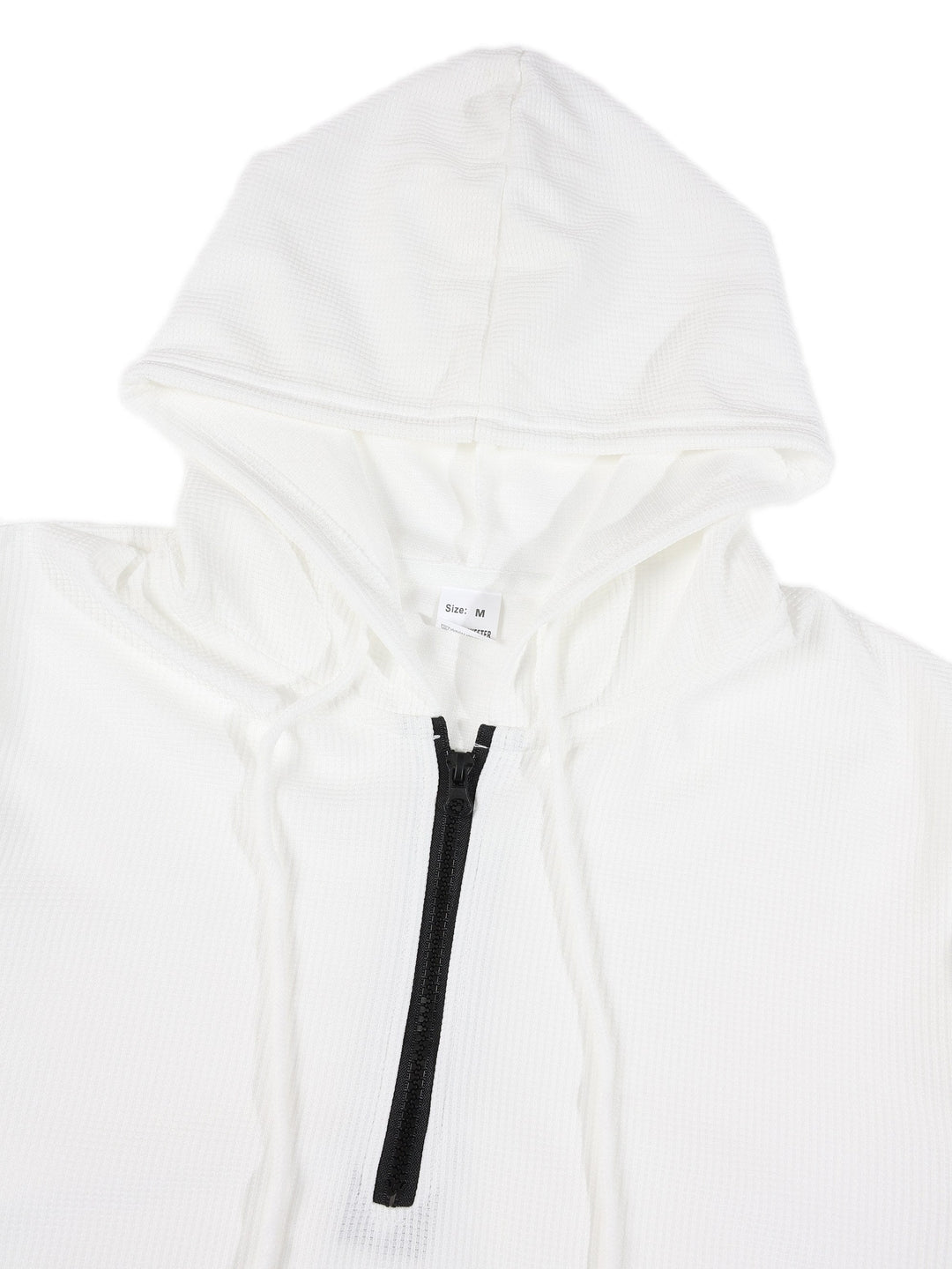 Sweat gaufré à ouverture demi-zip — gros plan du col