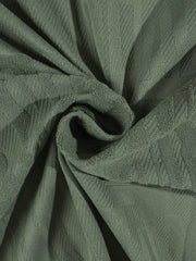 Ensemble sport coupe ample vert olive — détail tissu gaufré