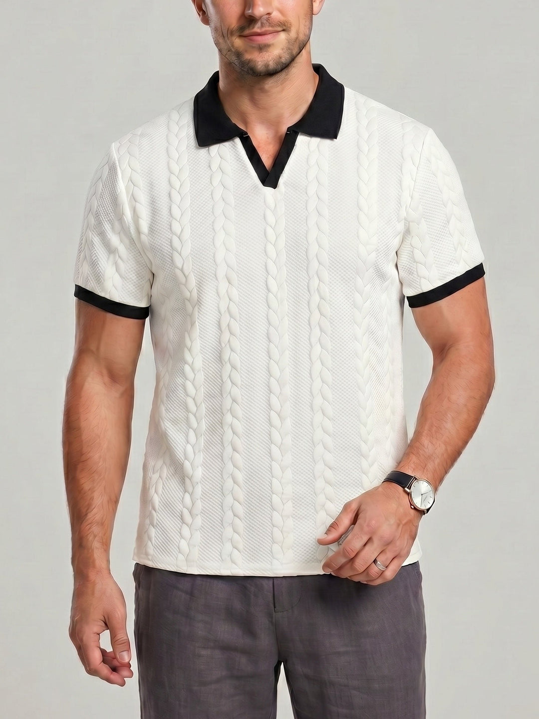 Polo texturé à bordures contrastées — vue principale du produit.