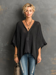 Pull ample à manches chauve-souris noir — vue portée de face