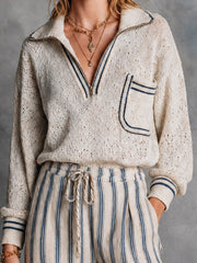 Pull crème marine zippé — gros plan du col, de la poche et du liseré