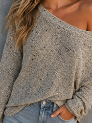 Haut beige chiné épaules dénudées — gros plan de l'encolure et de la maille chinée