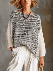 Pull chiné blanc-noir col bateau — vue portée de face, corps chiné et manches unies, collier sombre
