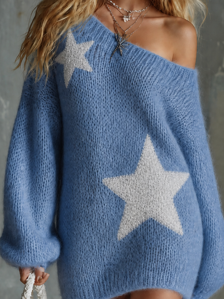 Robe en maille bleu ciel, gros plan de l'étoile