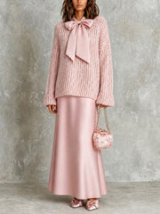 Ensemble rose pull noué — vue portée en pied, petit sac rose en forme de cœur
